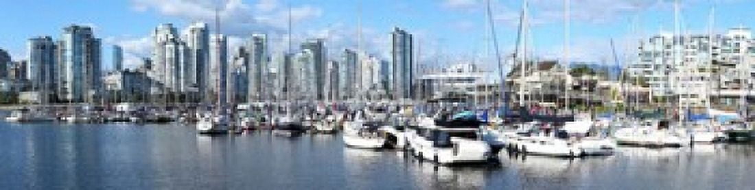 Boats at marina with Vancouver skylines in the background False Creek British Columbia Canada Canvas Art - Panoramic Images (20 x 5)