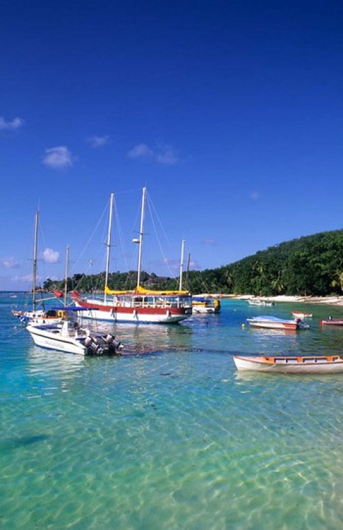 Boats beach La Digue Seychelle Islands Canvas Art - Bill Bachmann DanitaDelimont (22 x 34)