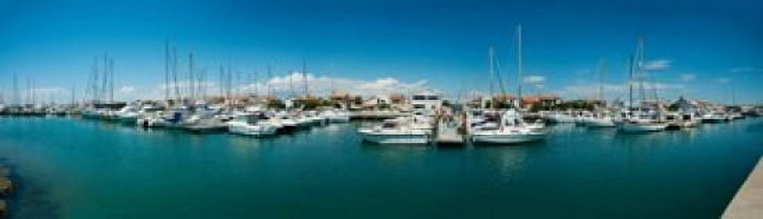Boats docked in the small harbor Saintes-Maries-De-La-Mer Bouches-Du-Rhone Provence-Alpes-Cote dAzur France Canvas Art - Panoramic Images (20 x 6)