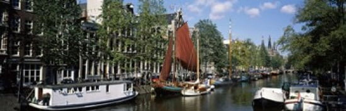 Boats in a channel Amsterdam Netherlands Canvas Art - Panoramic Images (18 x 6)