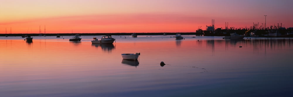 Boats in an ocean at sunset Provincetown Cape Cod Barnstable County Massachusetts USA Canvas Art - Panoramic Images (6 x 18)