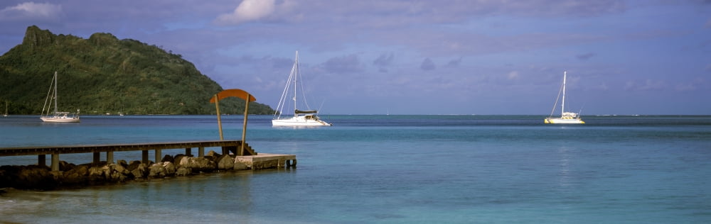 Boats in the Pacific ocean Tahiti French Polynesia Canvas Art - Panoramic Images (27 x 9)