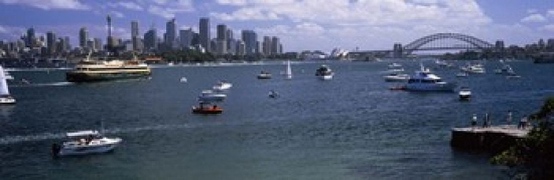 Boats in the sea with a bridge in the background Sydney Harbor Bridge Sydney Harbor Sydney New South Wales Australia Canvas Art - Panoramic Images (18 x 6)