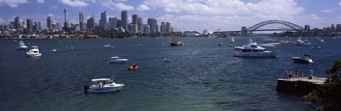 Boats in the sea with a bridge in the background Sydney Harbor Bridge Sydney Harbor Sydney New South Wales Australia Canvas Art - Panoramic Images (18 x 6)