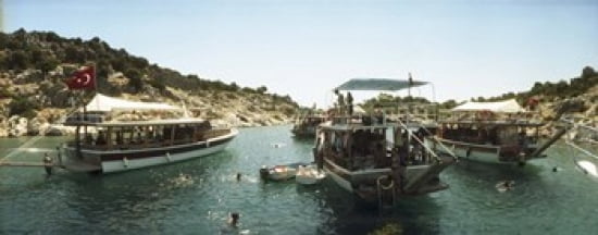 Boats with people swimming in the Mediterranean sea Kas Antalya Province Turkey Canvas Art - Panoramic Images (30 x 12)