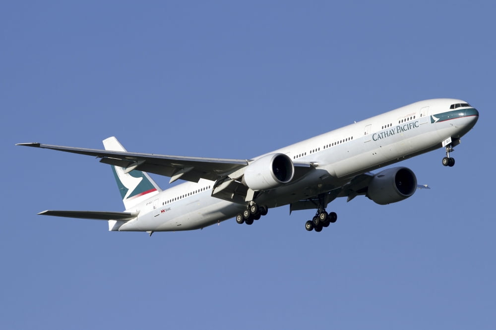 Boeing 777-200 of Cathay Pacific Airways Canvas Art - Luca NicolottiStocktrek Images (35 x 24)