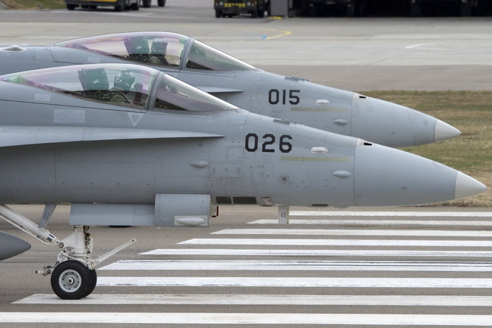 Boeing FA-18 Hornets of the Swiss Air Force Canvas Art - Luca NicolottiStocktrek Images (18 x 12)