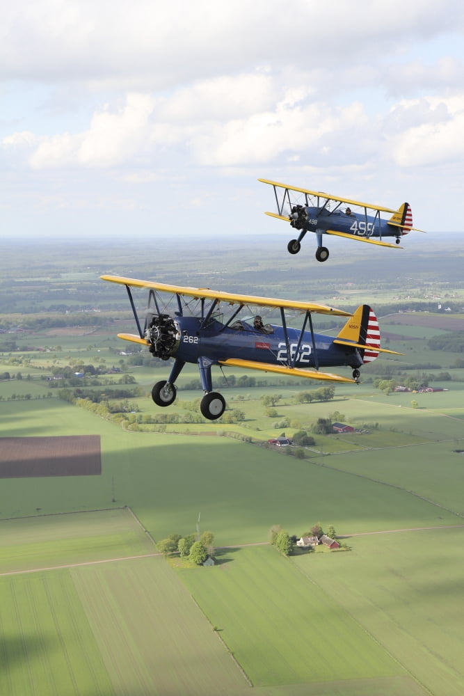 Boeing Stearman Model 75 Kaydet in US Army colors Canvas Art - Daniel KarlssonStocktrek Images (12 x 18)