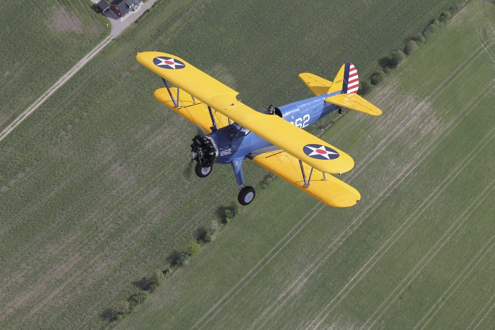 Boeing Stearman Model 75 Kaydet in US Army colors Canvas Art - Daniel KarlssonStocktrek Images (18 x 12)