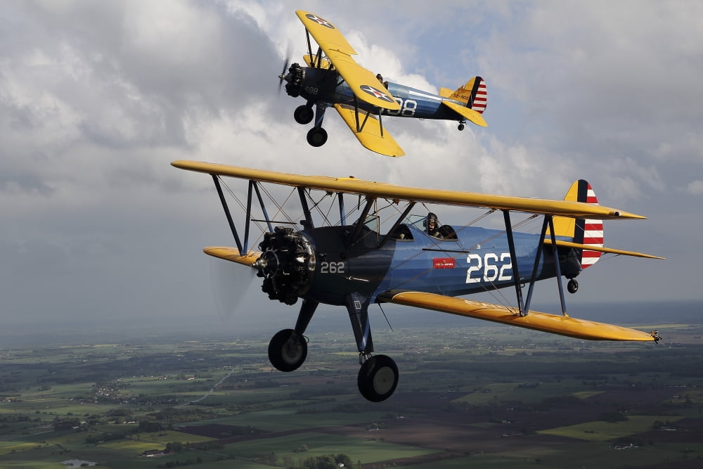 Boeing Stearman Model 75 Kaydet in US Army colors Canvas Art - Daniel KarlssonStocktrek Images (18 x 12)