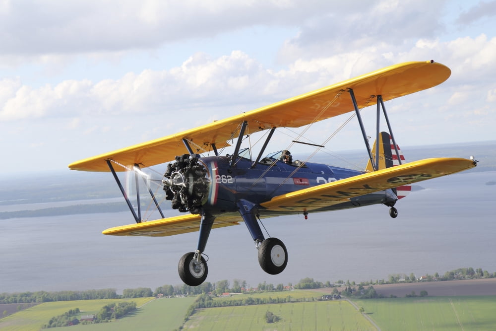Boeing Stearman Model 75 Kaydet in US Army colors Canvas Art - Daniel KarlssonStocktrek Images (35 x 24)