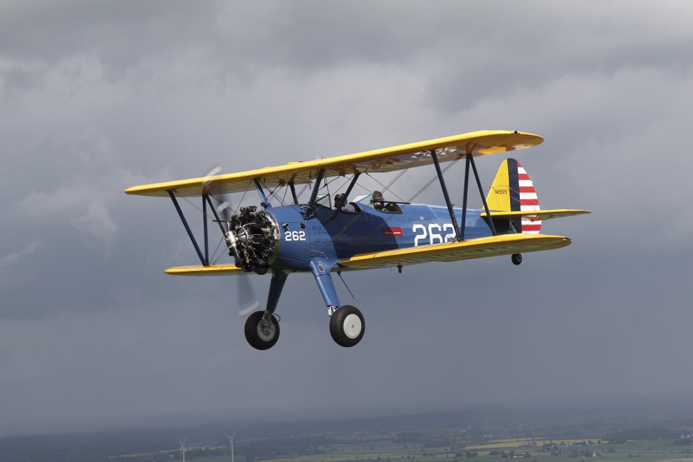 Boeing Stearman Model 75 Kaydet in US Army colors Canvas Art - Daniel KarlssonStocktrek Images (35 x 24)