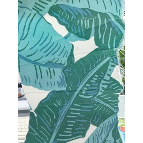 Boho Fringe Patio Umbrella offering UV 50+ full sun protection, 8 lightweight fiberglass ribs with push button tilt & crank, leaf pattern perfect for garden, deck and poolside shading