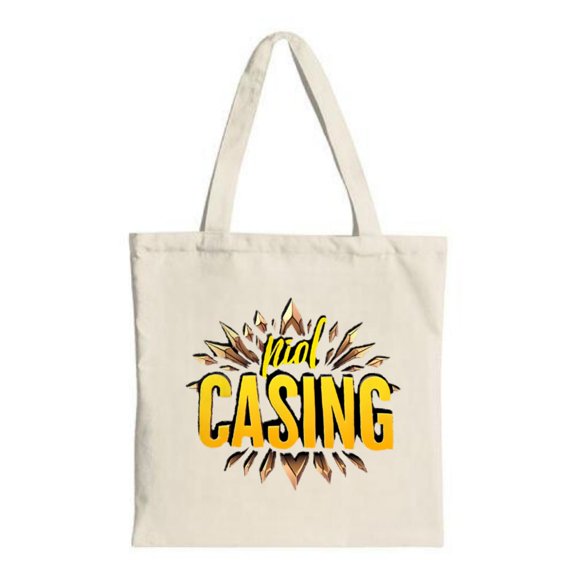 Bold " Mal CASING " text in yellow and black with dynamic decorative bursts this canvas tote bag is perfect for shopping travel and parties