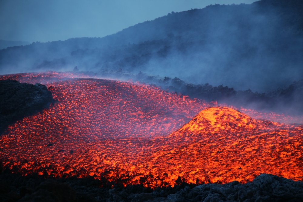 Boulder rolling in lava flow at dusk during eruption of Mount Etna volcano Sicily Italy Canvas Art - Richard RoscoeStocktrek Images (18 x 12)