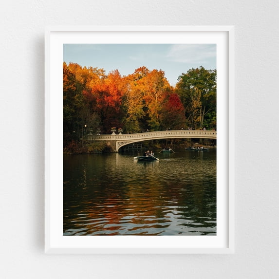 Bow Bridge in Autumn, Central Park - Manhattan New York Photography Autumn Bridge Boat Scenic Nature Water Landscape White Framed Wall Art Print 12 x 16 inches