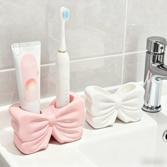 Bow-Shaped Toothbrush Holder 1PC,Bathroom Organizer 5.51x3.54x1.57in,Resin Countertop Storage for Sink Area, Keeps Brushes Separate & Tidy, Perfect for Shared Households & Gifts(Pink)