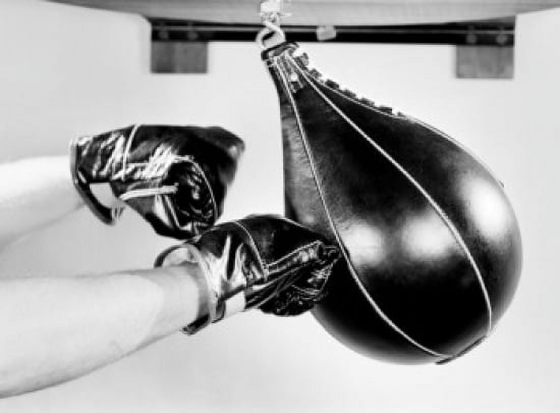 Boxer hitting punching bag Canvas Art - (18 x 24)