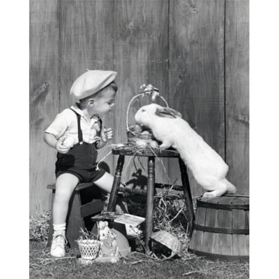 Boy Looking at Rabbit Reaching for Easter Eggs Poster Print - 18 x 24 in.