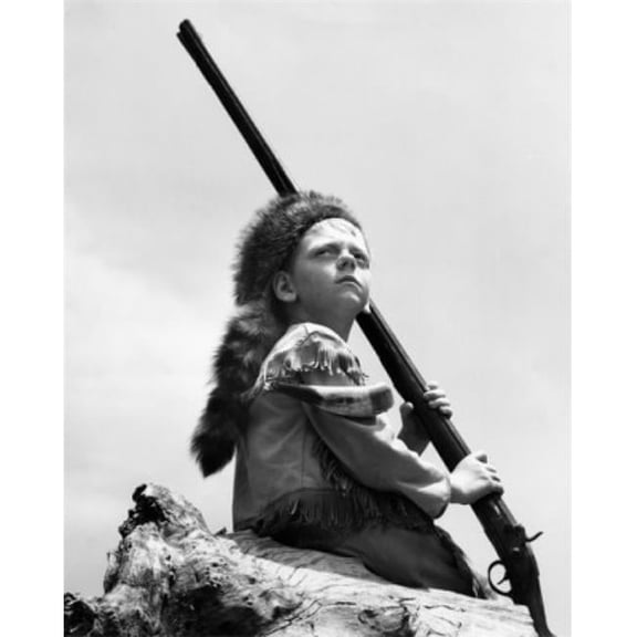 Boy Wearing Raccoon Hat Holding Rifle Poster Print - 18 x 24 in.