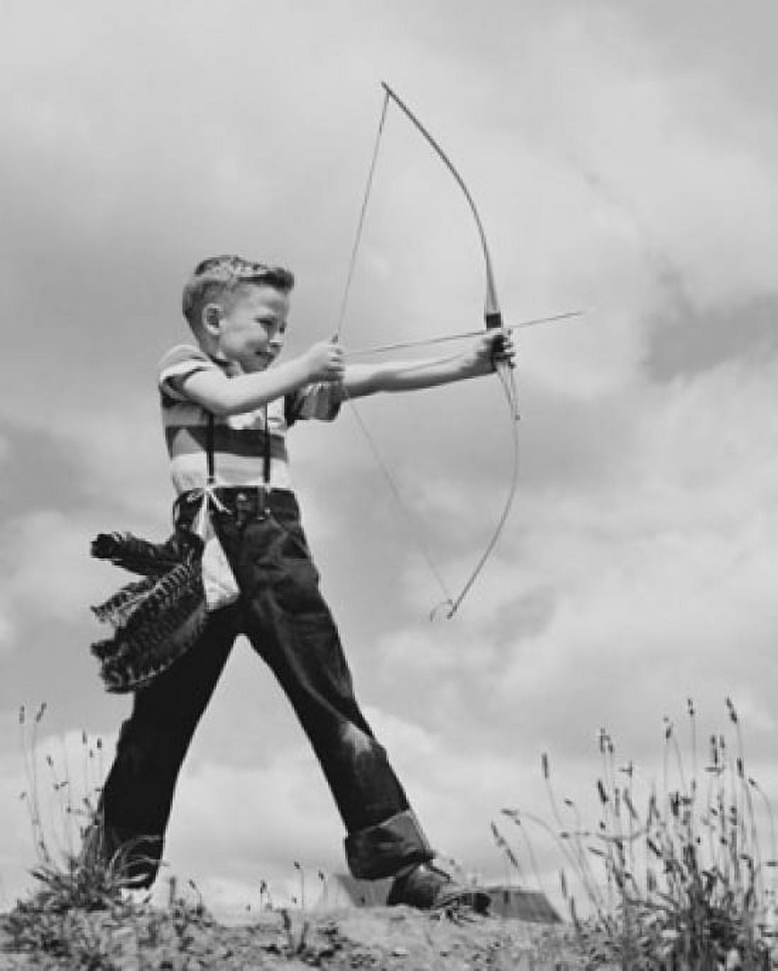 Boy aiming bow and arrow Canvas Art - (24 x 36)