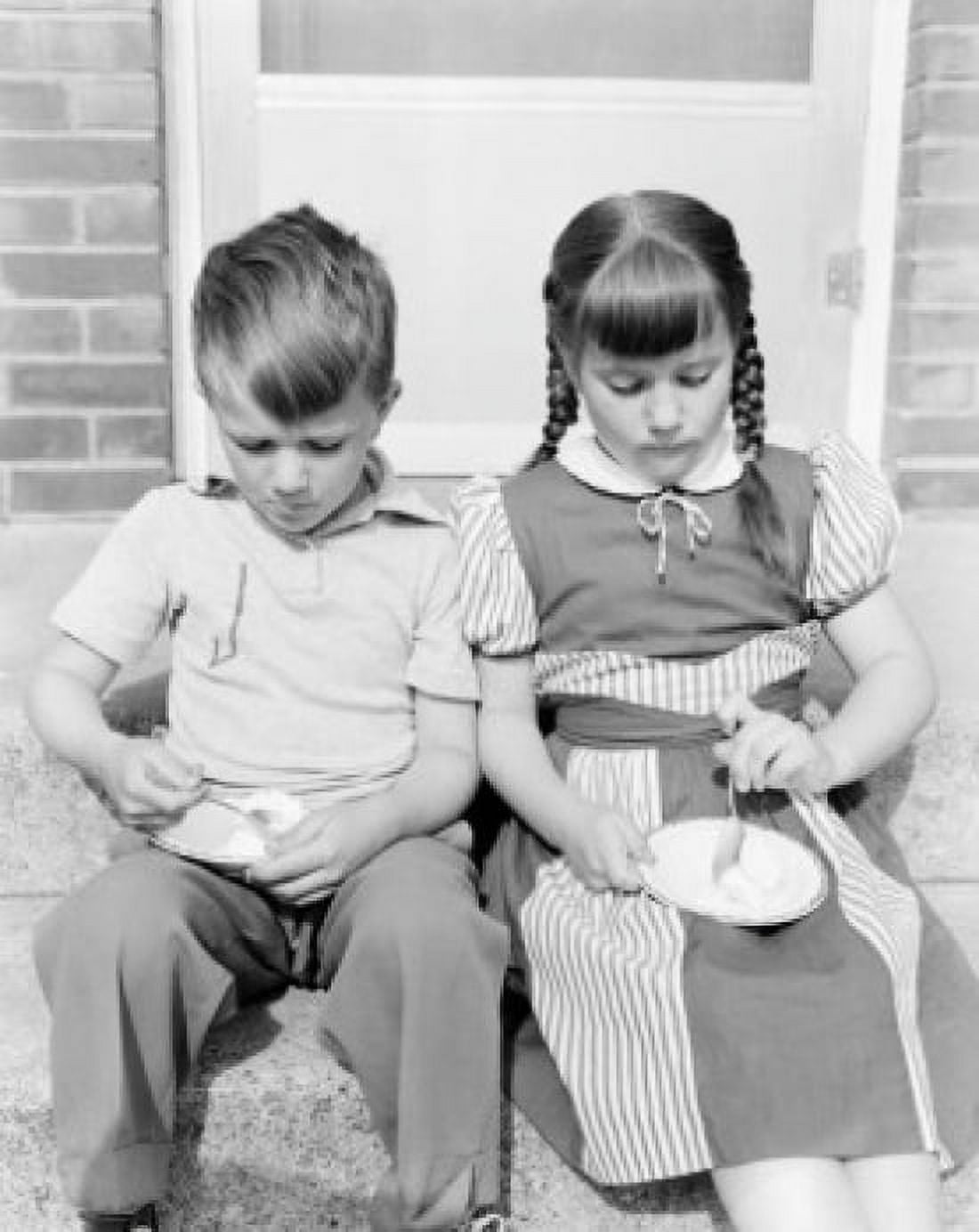 Boy and girl eating ice cream on porch Canvas Art - (18 x 24)