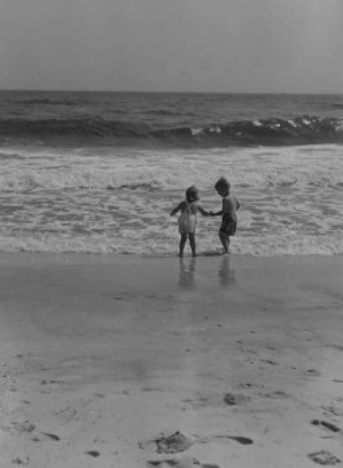Boy and girl playing on beach Canvas Art - (18 x 24)