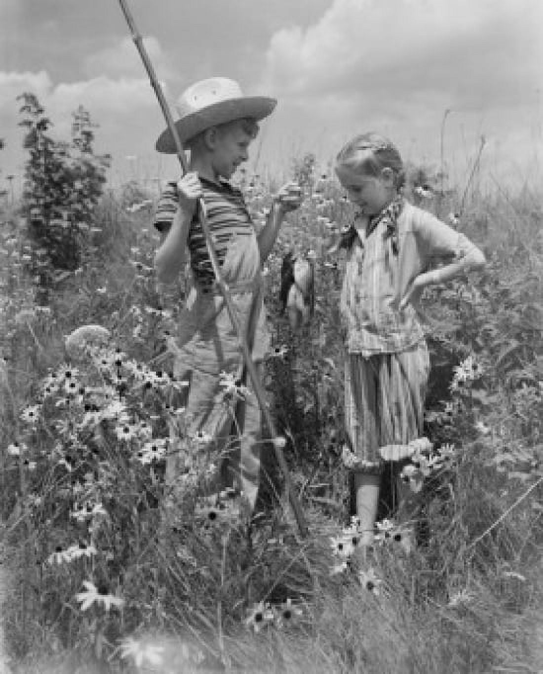 Boy and girl with catch of fish Canvas Art - (24 x 36)