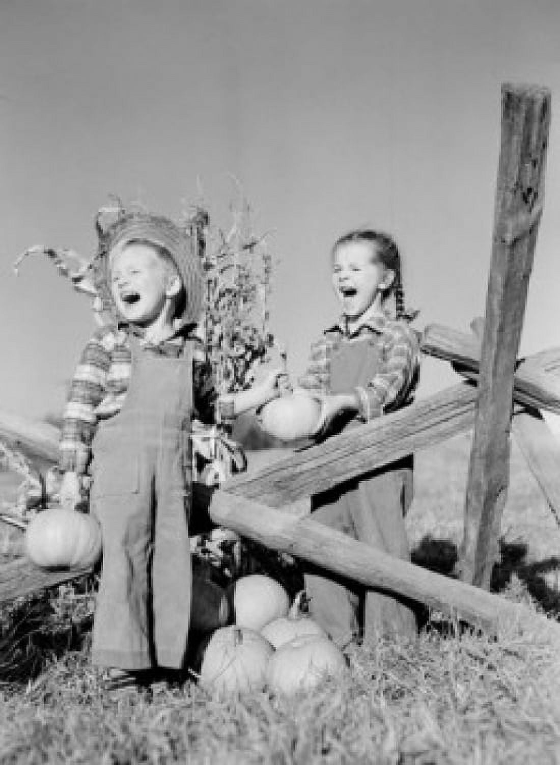 Boy and girl with pumpkins on farm Canvas Art - (18 x 24)