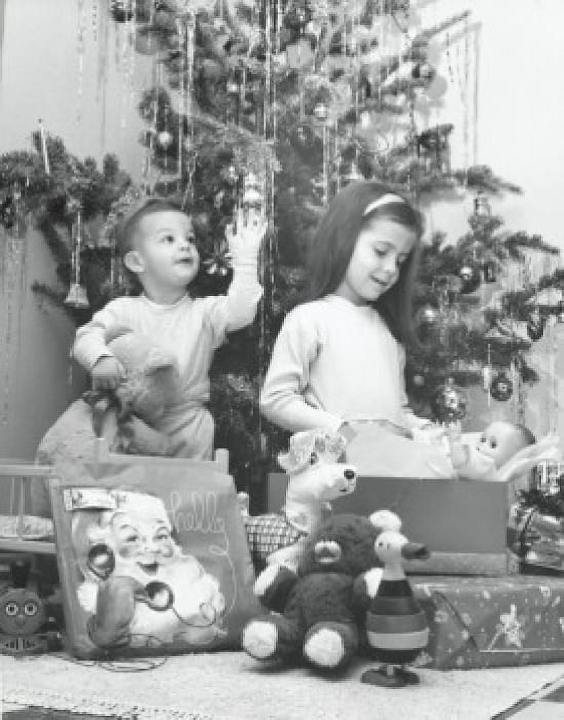 Boy and his sister opening Christmas presents Canvas Art - (18 x 24)