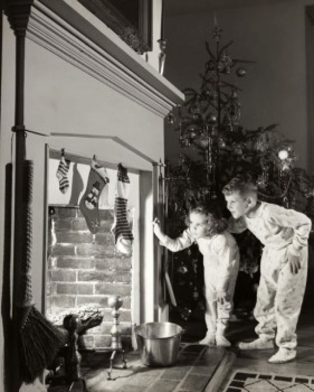 Boy and his sister peeking into a fireplace Canvas Art - (18 x 24)