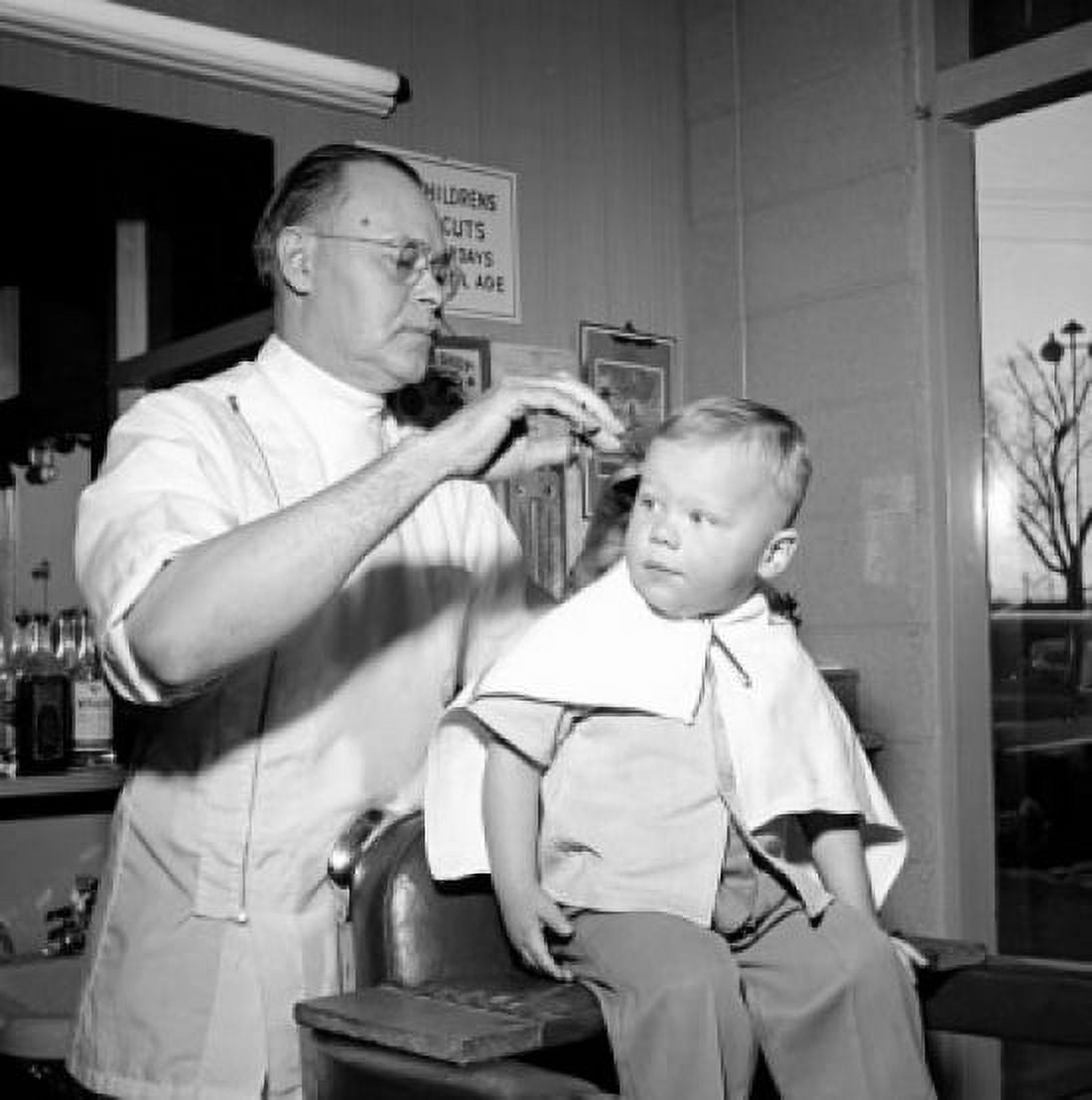 Boy at barber Canvas Art - (24 x 36)
