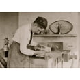 thumbnail image 1 of Boy at work on coil. Poster Print (18 x 24), 1 of 3