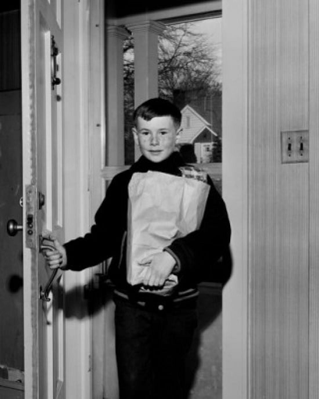 Boy bringing shopping from shop Canvas Art - (24 x 36)
