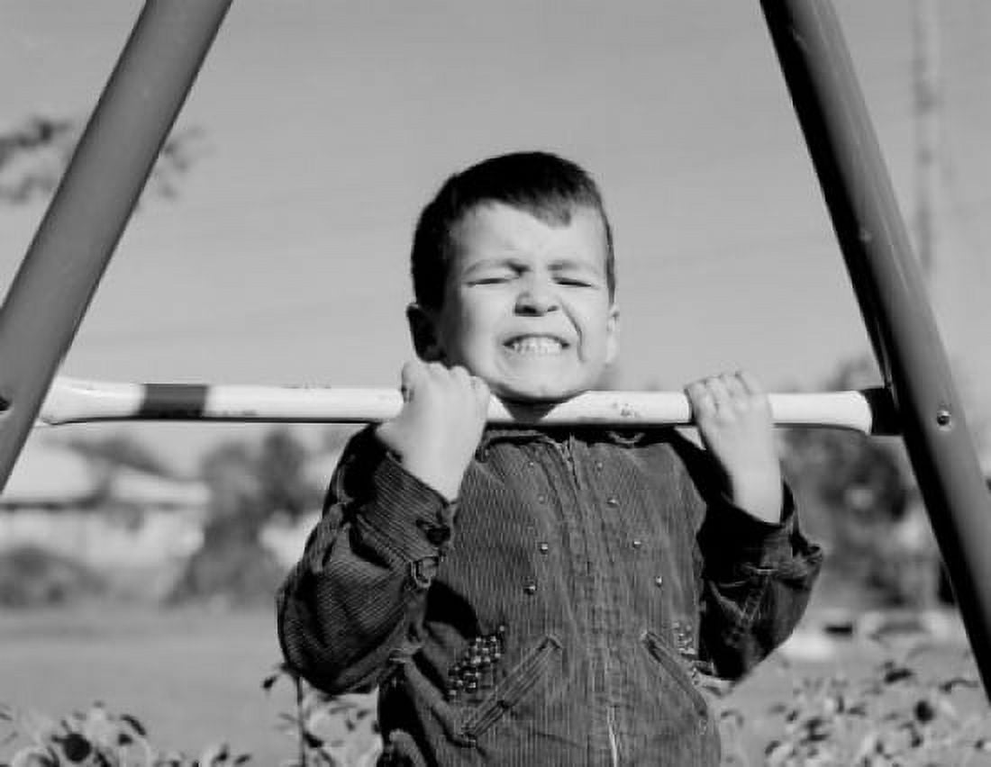Boy doing chin-ups Canvas Art - (18 x 24)