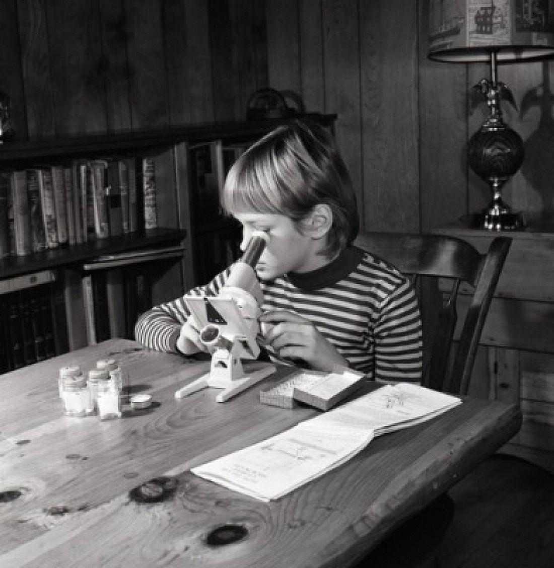 Boy doing homework Canvas Art - (18 x 24)