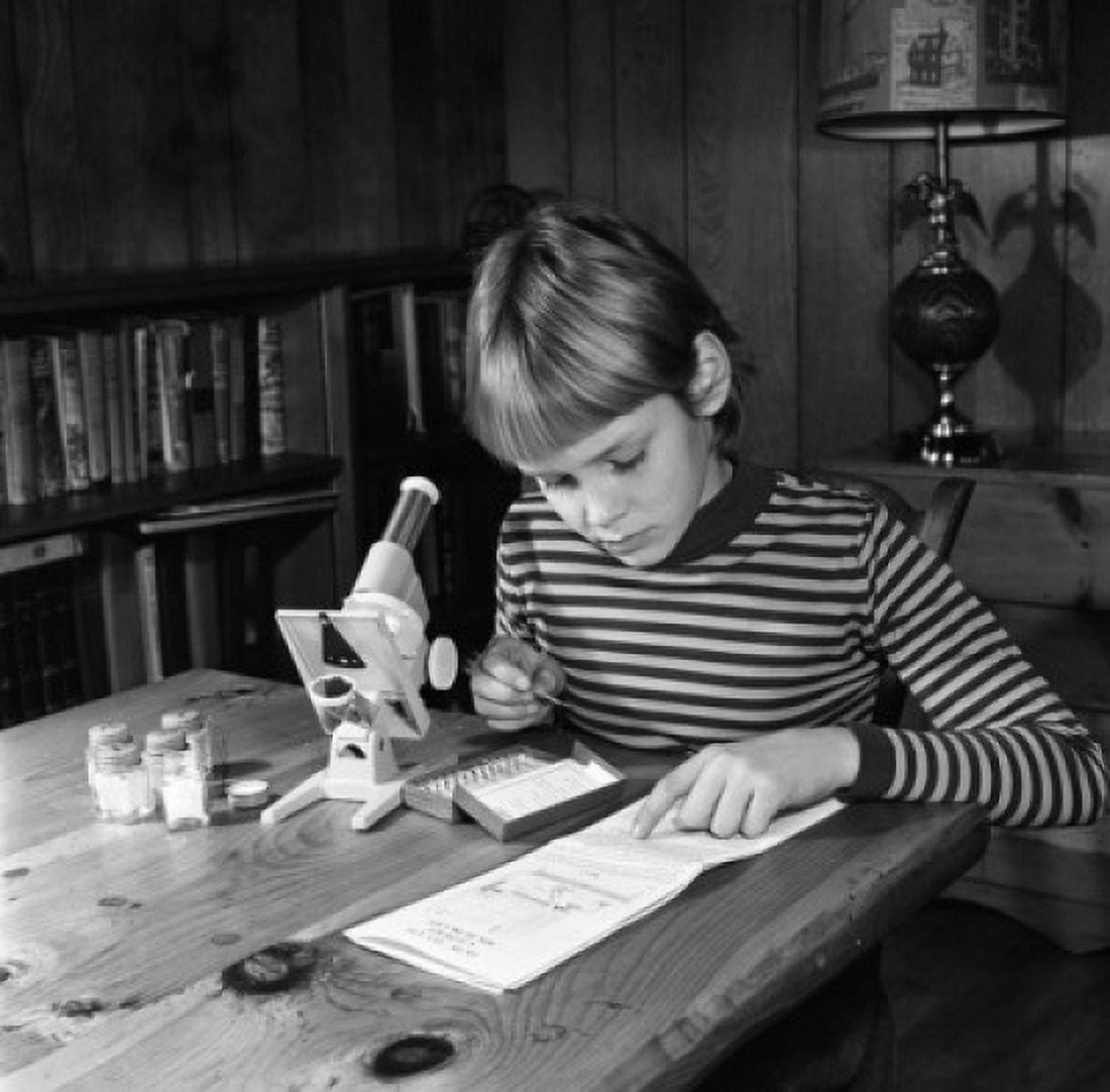Boy doing homework Canvas Art - (24 x 36)