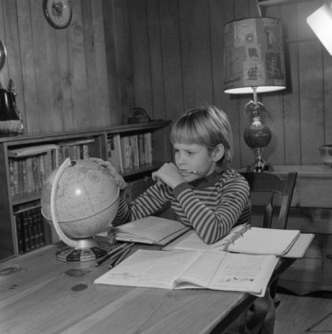 Boy doing homework Canvas Art - (24 x 36)