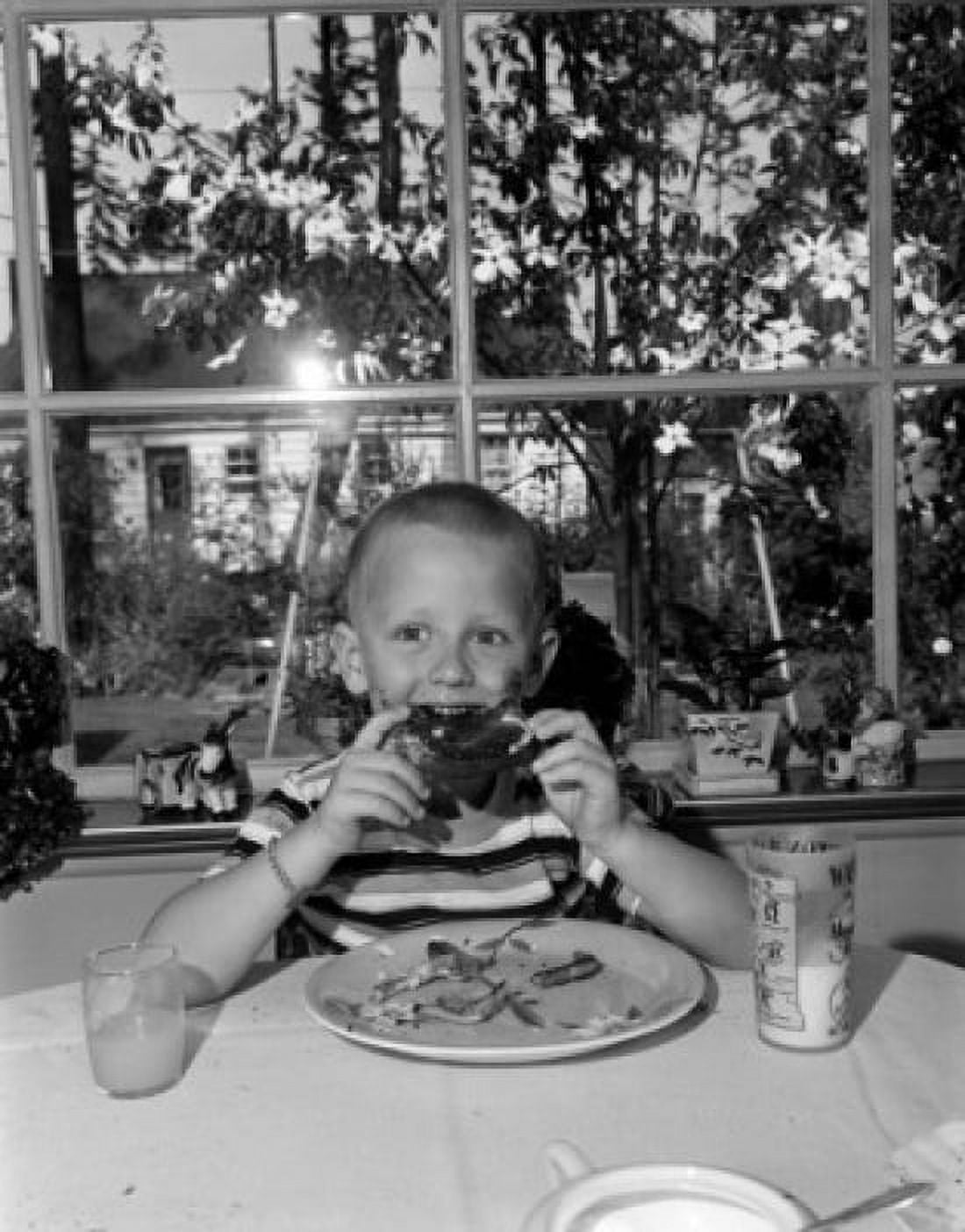 Boy eating Canvas Art - (24 x 36)