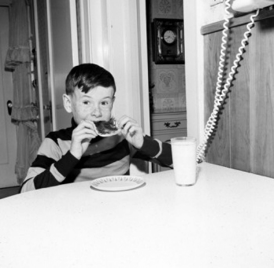 Boy eating bread with jam Canvas Art - (18 x 24)
