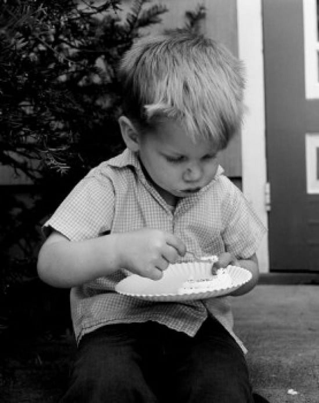 Boy eating dessert Canvas Art - (24 x 36)