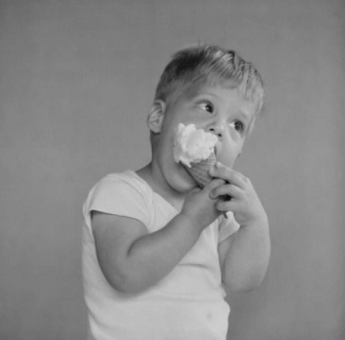 Boy eating ice cream Canvas Art - (18 x 24)