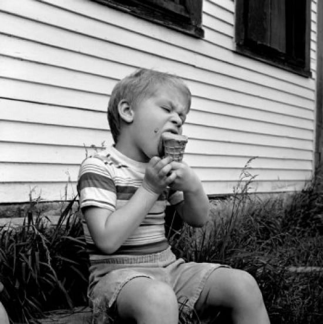 Boy eating ice-cream Canvas Art - (18 x 24)