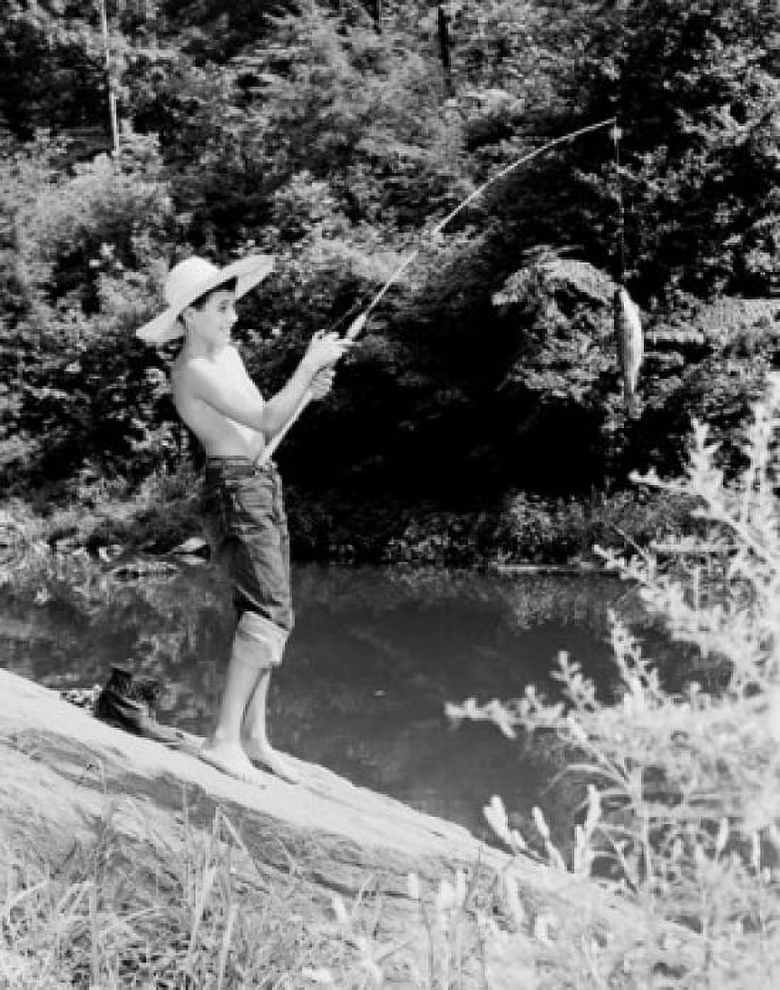 Boy fishing in river Canvas Art - (24 x 36)