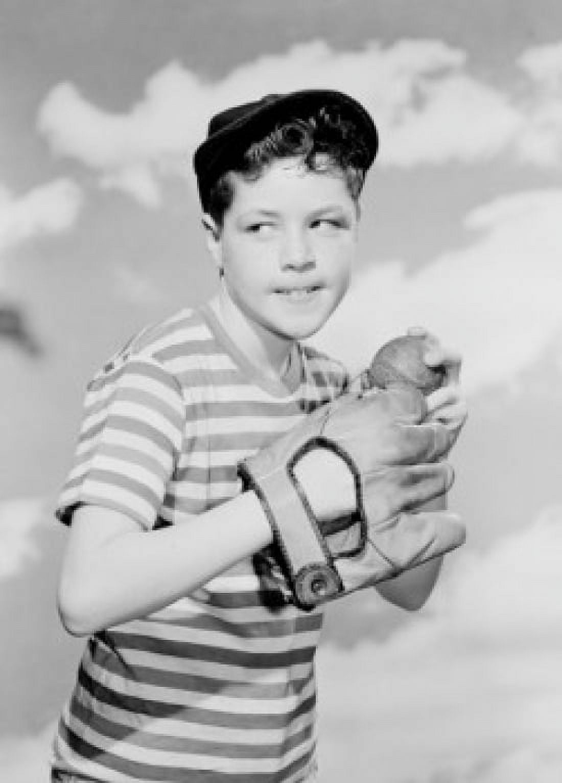 Boy holding baseball against cloudy sky Canvas Art - (24 x 36)