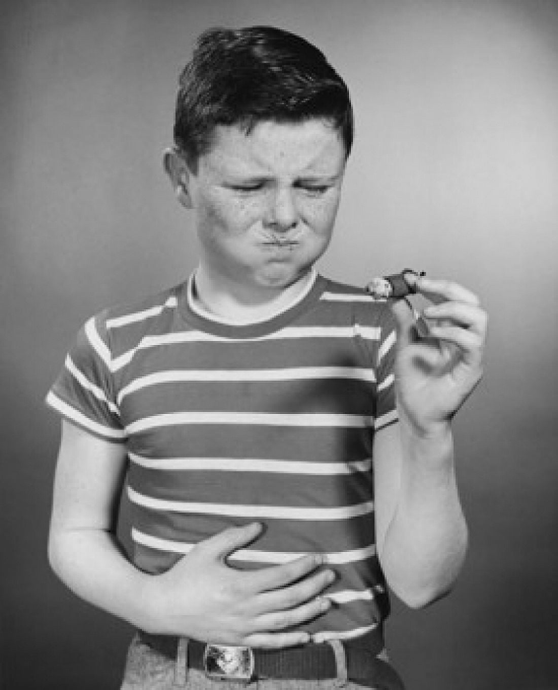 Boy holding cigar Canvas Art - (18 x 24)