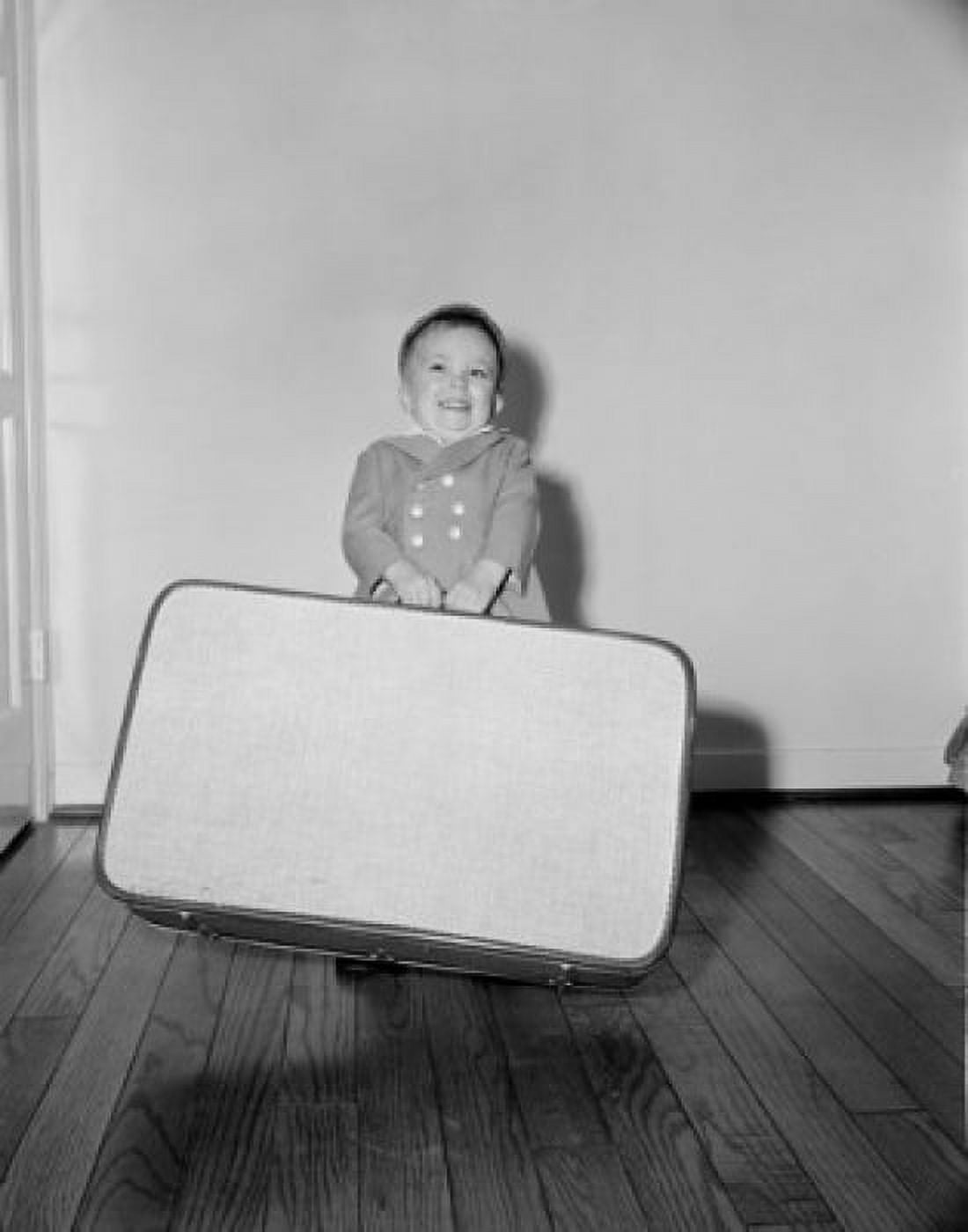 Boy holding large suitcase Canvas Art - (18 x 24)