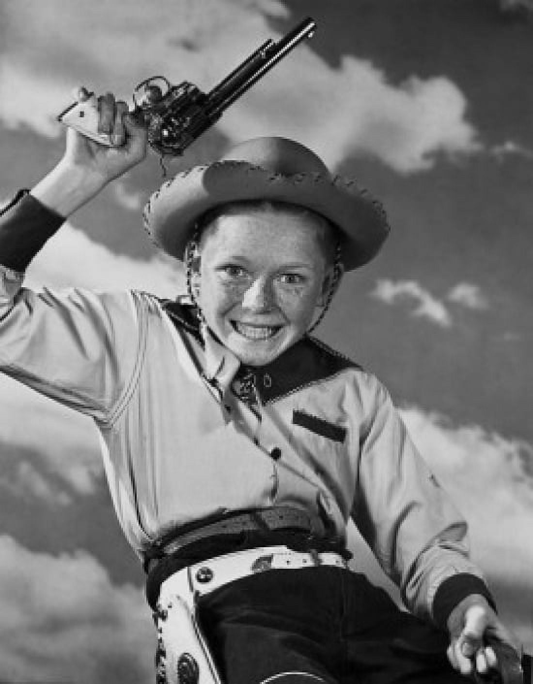 Boy in cowboy costume holding toy gun Canvas Art - (18 x 24)