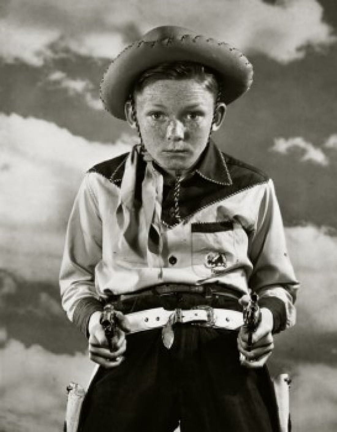 Boy in cowboy costume holding toy guns Canvas Art - (18 x 24)