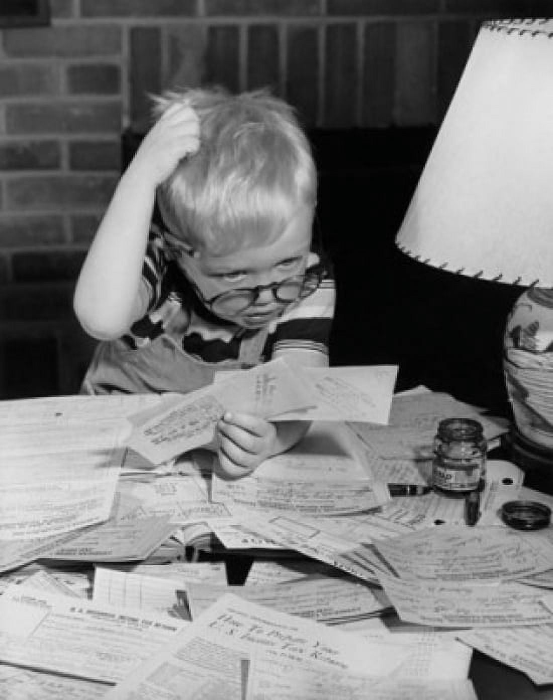 Boy looking at bills and scratching his head Canvas Art - (18 x 24)